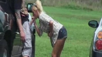 Blondy sucks outdoors