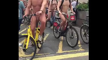 Nude people rally in other country naked people walking by cycle