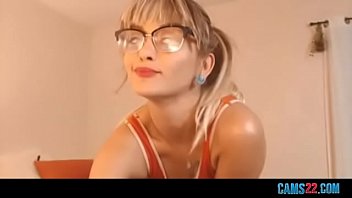 Beautiful blonde with glasses using a dildo and a vibrator to reach orgasm