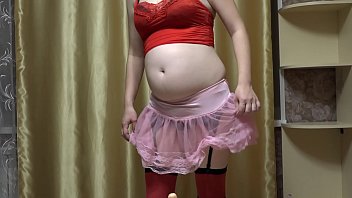 A mom in early pregnancy in a sexy outfit masturbates with a rubber dick&period; Juicy ass and overgrown cunt&period;