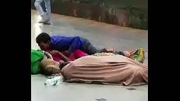 Desi Indian couple having sex in open station infront of crowd