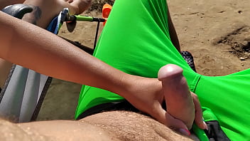 Handjob from young at the beach