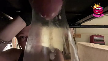 Mistress milks his ruined cumshots into a glass closeup